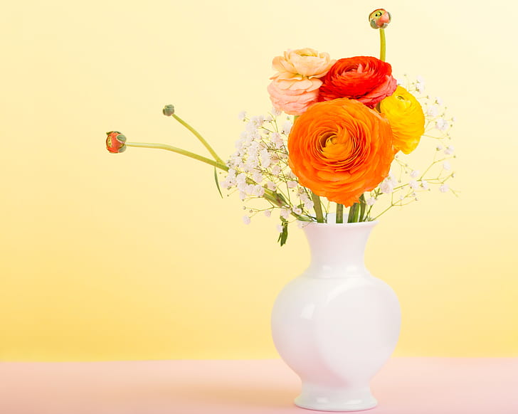 assorted-color petaled flower arrangement in vase