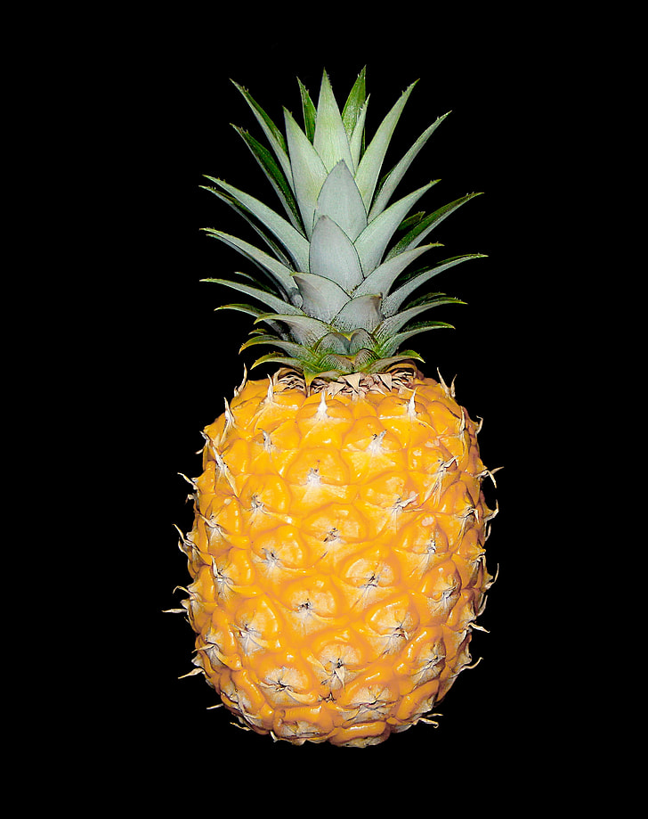 orange pineapple in black background