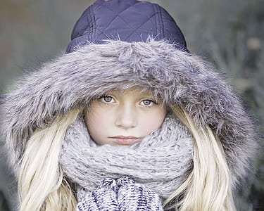 girl wearing scarf and fur-lined hoodie