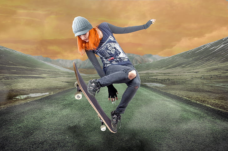 woman in blue jeans playing skateboard