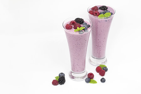 two pink berry-top smoothies