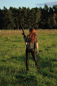 woman holding AR-15