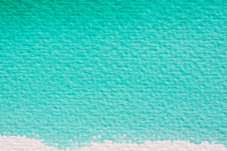 close-up photography of teal textile