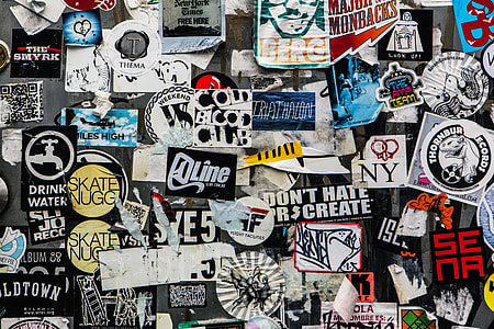 Stickers captured on a wall in Brooklyn, New York City