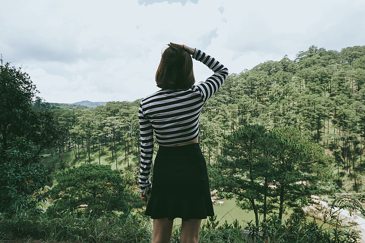 Woman standing and enjoying the scenery in Vietnam