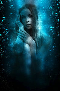 nude woman underwater photo