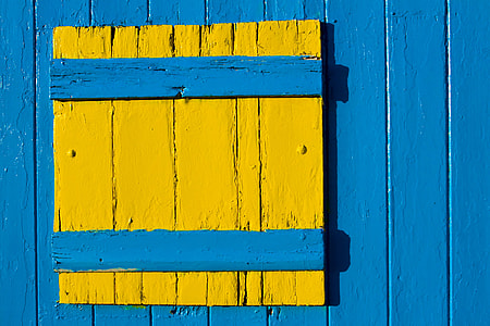 Close-up shot of a colourful wooden hut on the Kent Coast in the South of England