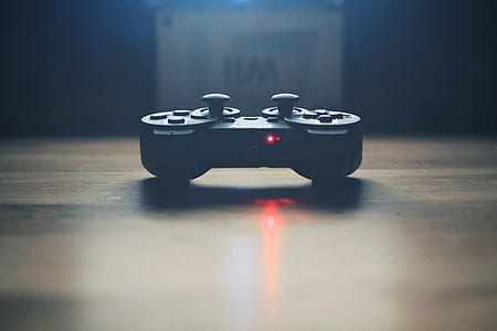 close up photograph of black game controller