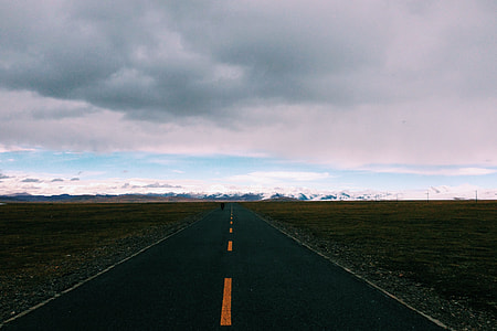 landscape photo of gray road