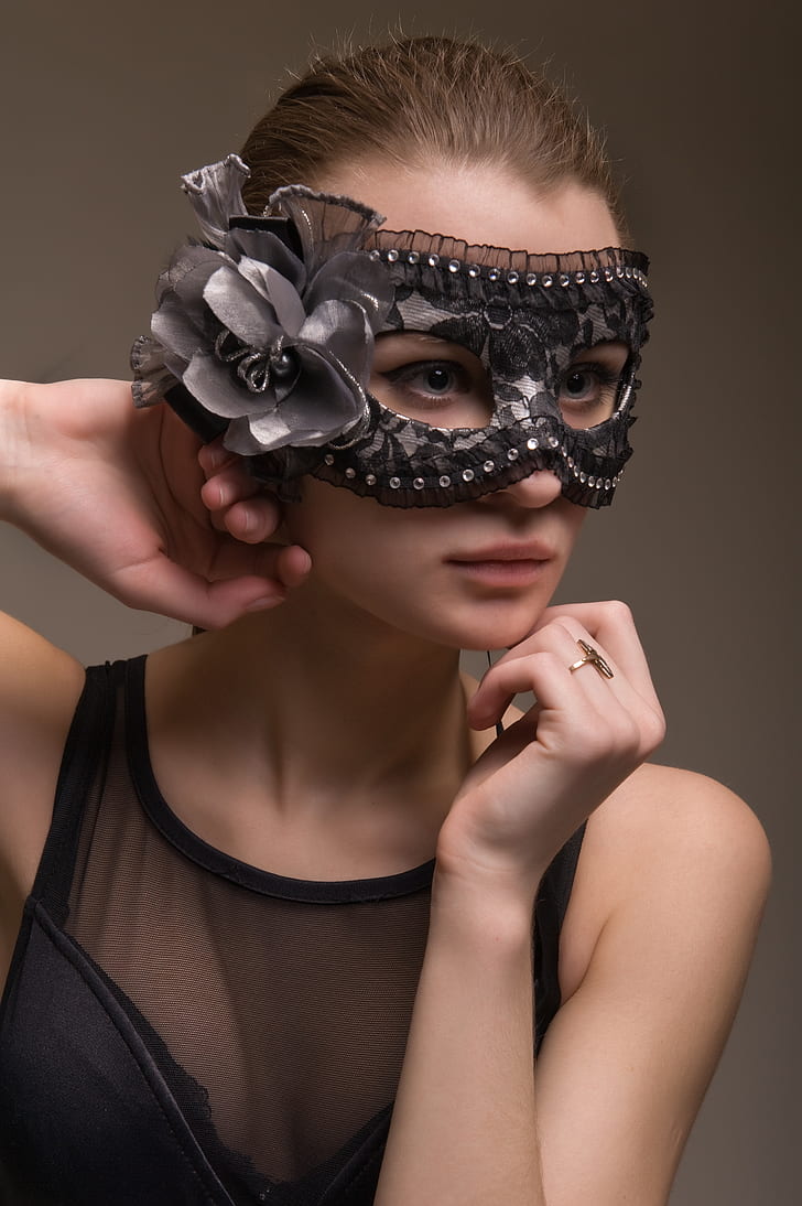 woman wearing floral columbina mask