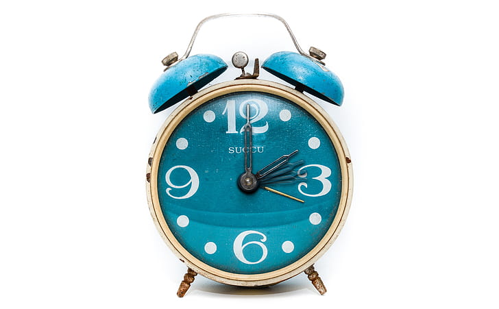 blue and brown analog alarm clock
