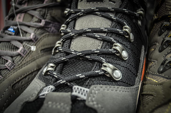 black and gray lace-up shoe close-up photography
