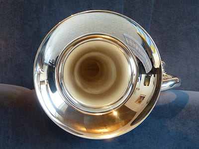 closeup photo of brass-colored rod