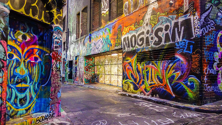 photo of street full of graffiti