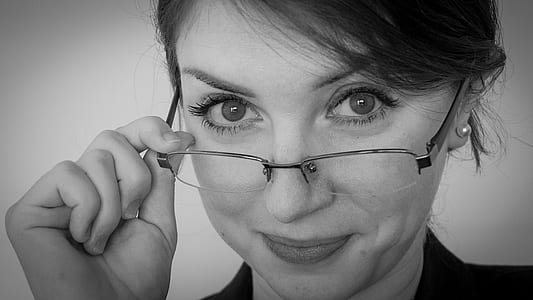 woman wearing eyeglasses with black frames