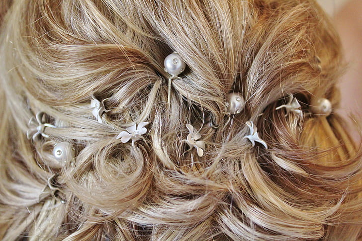 woman's hair with white beads