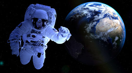 astronaut floating on outer space near earth