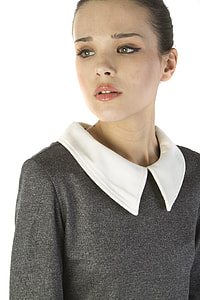 woman wearing white and gray peter-pan neckline long-sleeved top