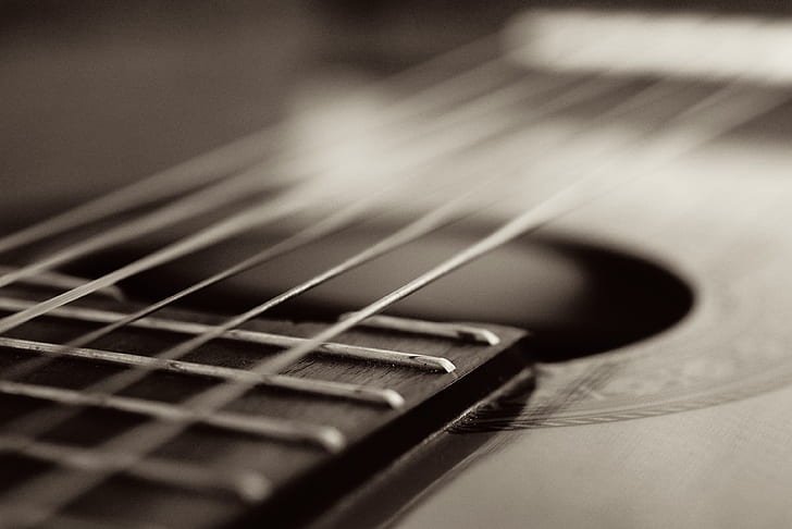 grayscale photography of string guitar