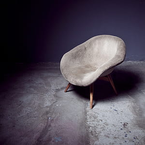 photo of gray padded brown wooden chair