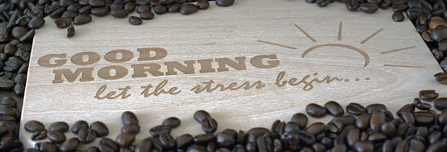 brown coffee beans with Good Morning Let the Stress begin text overlay