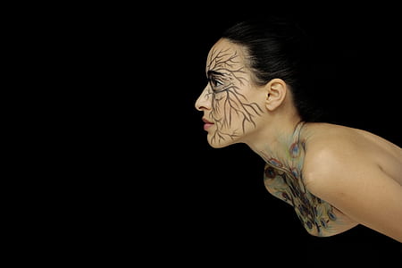 photo of woman with face paint