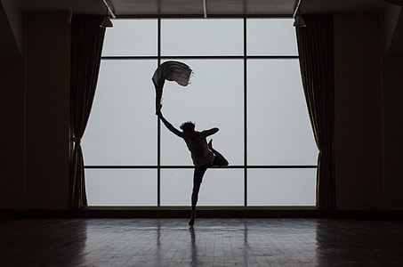 silhouette of dancing person