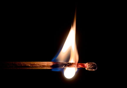macro photography of match with fire