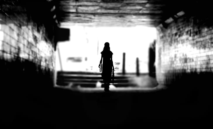 woman walking on alley