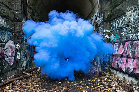 blue smoke spread between walls
