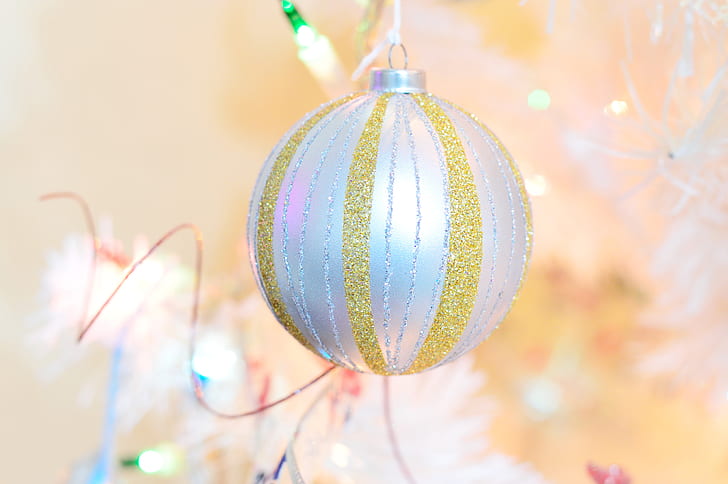 white and gold glitter bauble