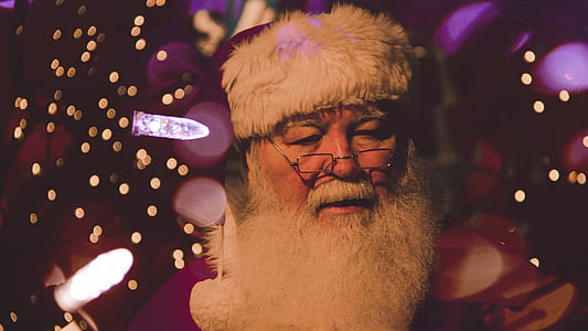 shallow focus photography of Santa Claus