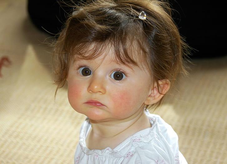 cute baby girl brown eyes
