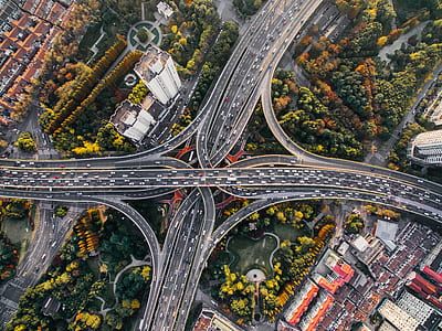 vehicles traveling on road aerial photo