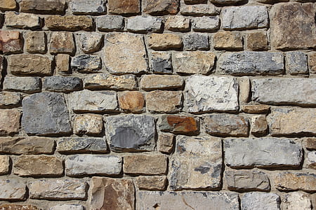 brown and gray irregular pattern bricked wall