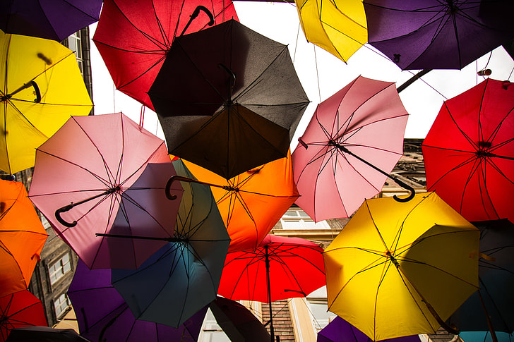 photography of assorted-color umbrellas