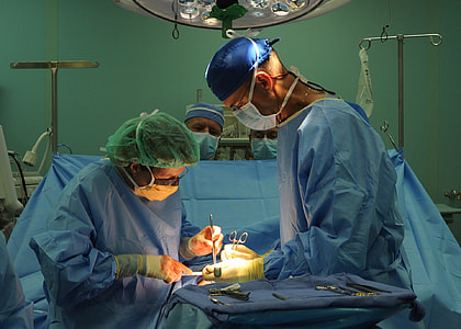 doctors operating a patient