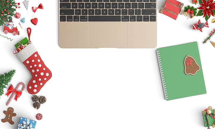 flat lay photography of 2016 gold MacBook Pro beside green notebook