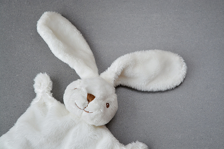 closeup photography of white rabbit plush toy