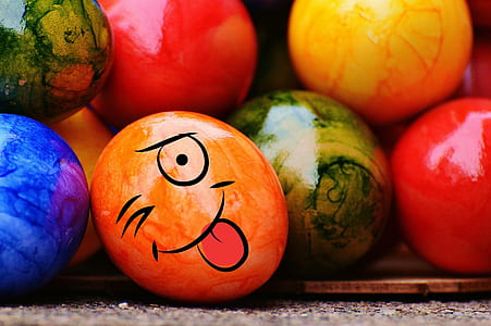 orange emoji painted egg