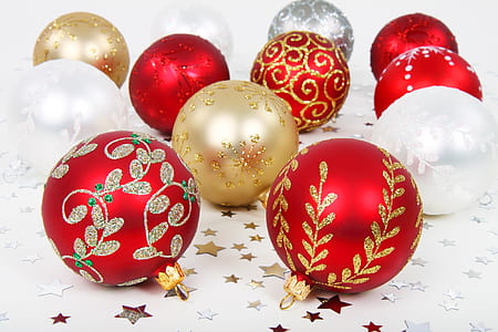 photo of Christmas balls on white textile