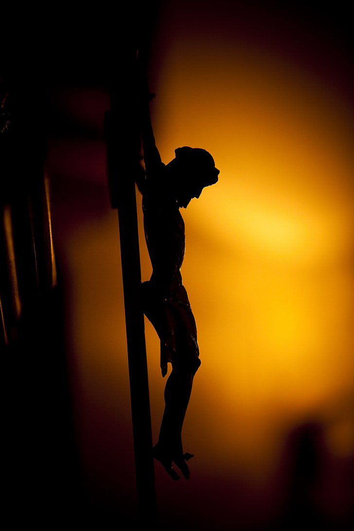 silhouette photo of crucifix