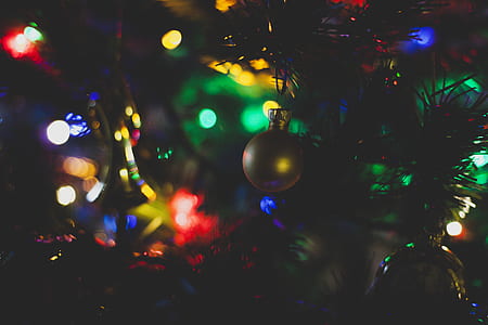 Closeup Photography of Christmas Bauble Hanging on Tree