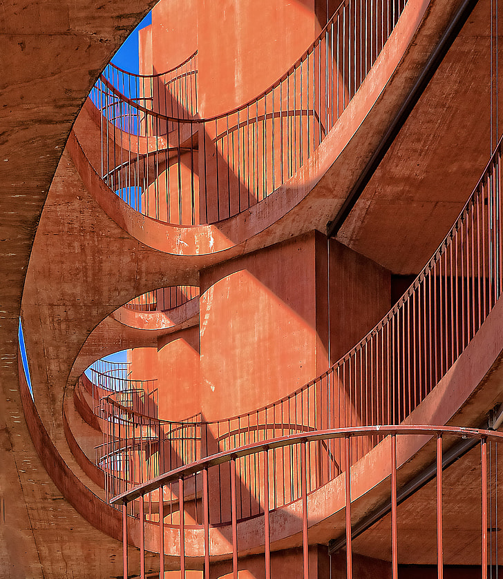 portrait photography of orange staircase