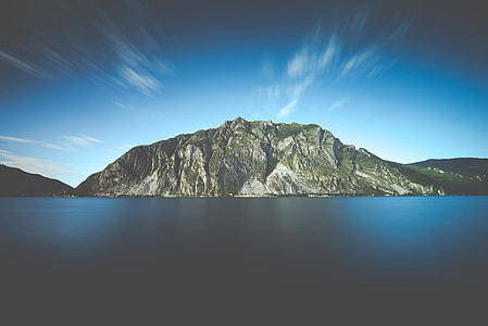 landscape photo of gray mountain near body of water