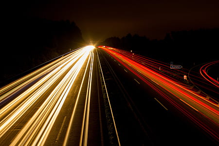 Speeding Car on High Way during Night Time