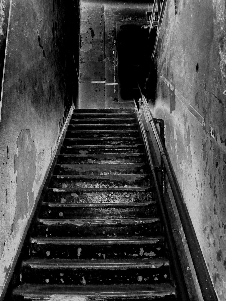 grayscale photo of concrete stair