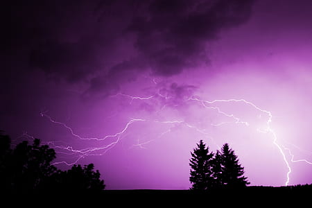 purple and black clouds with lightning