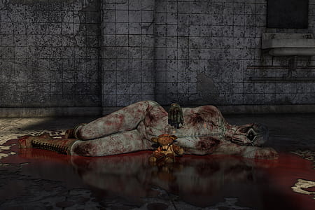 zombie lying on floor near gray concrete wall