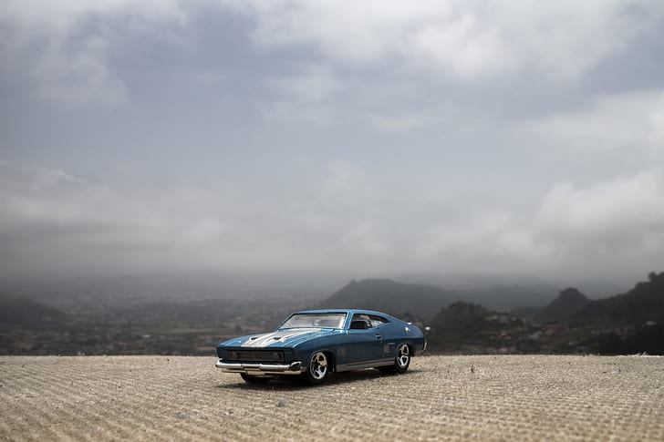 photography of blue Ford Mustang Mach 1
